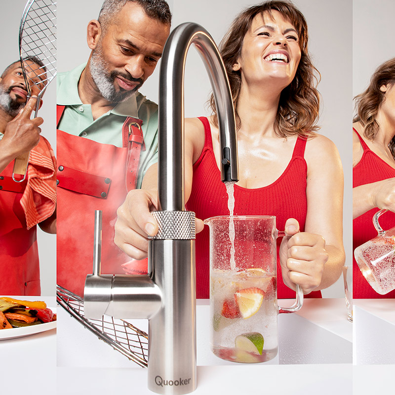 Couple using Quooker kitchen tap